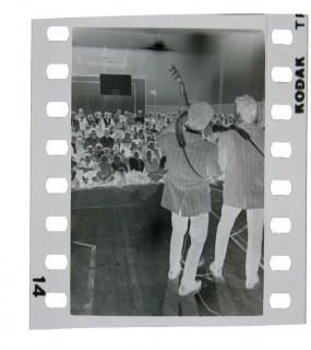 Black & White Photograph and Negative from the Everly Brothers Concert Taken by A. Rickerby. Photograph measures approximately 4" x 6".