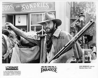 Photo: Print: Press Release: Movie: Guns of Paradise