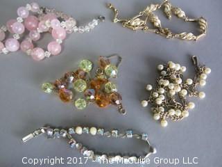 Assortment of jewelry including necklaces