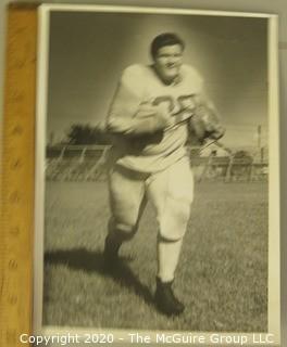 1957 Black & White Photo of Pete Snapko, 300 Pound South Guard taken by Paul Siegel.  Measures approximately 8" x 10". 