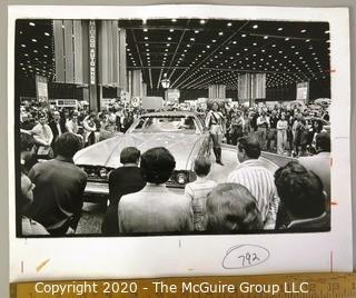 Large Format Unframed Black & White Photograph from the Chicago Auto Show by John White. Measures approximately 14" x 9".