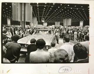 Large Format Unframed Black & White Photograph from the Chicago Auto Show by John White. Measures approximately 14" x 9".