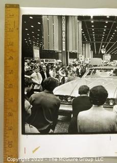 Large Format Unframed Black & White Photograph from the Chicago Auto Show by John White. Measures approximately 14" x 9".