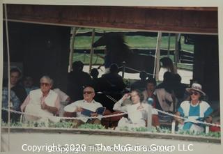 Large Format Color Photo of Merv Griffin and Armand Hammer at Yearling Horse Auction in Palm Springs. Photo by John Bryson. 