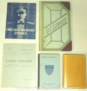 Collection including Military Clothing Catalog, Ledger, French Pupil's Report Card and book about U.S. Diplomacy