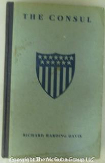 Collection including Military Clothing Catalog, Ledger, French Pupil's Report Card and book about U.S. Diplomacy