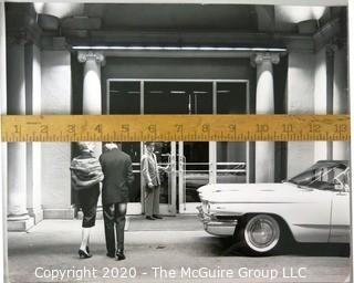 Large Format Black & White Photo of Couple walking into hotel.  Presumed Rickerby