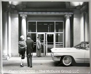 Large Format Black & White Photo of Couple walking into hotel.  Presumed Rickerby