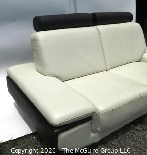 Black & White Modern Contemporary Faux Leather Couch; note minor damage from storage) Description altered 7/29/20 at 18:33 ET).