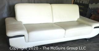 Black & White Modern Contemporary Faux Leather Couch with minor damage from storage/transport. (Description altered 7/29/20 at 18:36 ET)