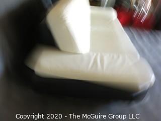 Black & White Modern Contemporary Faux Leather Couch with minor damage from storage/transport. (Description altered 7/29/20 at 18:36 ET)