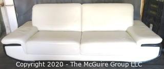 Black & White Modern Contemporary Faux Leather Couch with minor damage from storage/transport. (Description altered 7/29/20 at 18:36 ET)