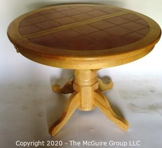 Round Pedestal Table with Terracotta Tile Top and Hidden Expandable Leaf Underneath.  