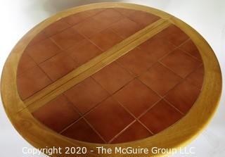 Round Pedestal Table with Terracotta Tile Top and Hidden Expandable Leaf Underneath.  