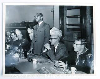 Photo: Historical: Fairfax VA: undated: Boy Scouts of America meeting with members wearing novelty paper hats and a black person speaking