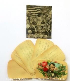 Celluloid Swivel Note Pad with President Lincoln Sticker and Small Lincoln Print. 