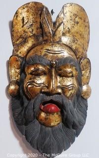 Large Carved Asian Wooden Mask with Gilt Paint.  Measures approximately 22" X 11".