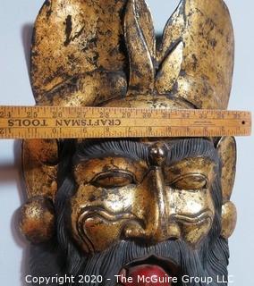 Large Carved Asian Wooden Mask with Gilt Paint.  Measures approximately 22" X 11".