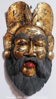 Large Carved Asian Wooden Mask with Gilt Paint.  Measures approximately 22" X 11".