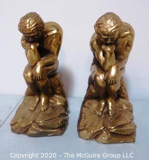 Set of Two Heavy Bronze or Brass Bookends in the Style of the Thinker by Rodin.