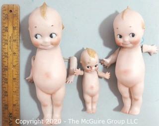 Three Porcelain or Bisque Kewpie Dolls with Frozen Standing Legs.