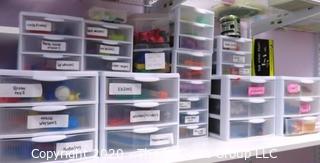 Plastic Organizer Shelf and Drawer Unit Full of Crafting and Toys Supplies.- Room 13 Toy Closet