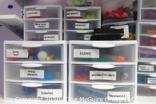 Plastic Organizer Shelf and Drawer Unit Full of Crafting and Toys Supplies.- Room 13 Toy Closet