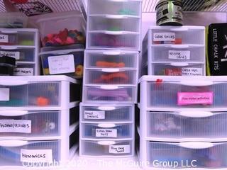 Plastic Organizer Shelf and Drawer Unit Full of Crafting and Toys Supplies.- Room 13 Toy Closet