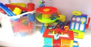 Plastic Organizer Shelf and Drawer Unit Full of Crafting and Toys Supplies.- Room 13 Toy Closet