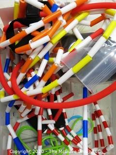 Group of Tennis Rackets, Bead Jump Rope, Orbit Jump Ball -  Room 13 Toy Closet