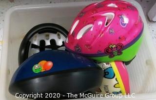 Box of Children's Bike Helmets - Room 13, Toys Closet