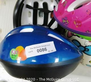 Box of Children's Bike Helmets - Room 13, Toys Closet