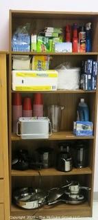 Wood Book Shelf Full of Cleaning & Entertaining Items Including Several Blenders, and Cookware.  Room 20 Kitchen