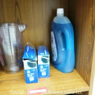 Wood Book Shelf Full of Cleaning & Entertaining Items Including Several Blenders, and Cookware.  Room 20 Kitchen