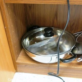 Wood Book Shelf Full of Cleaning & Entertaining Items Including Several Blenders, and Cookware.  Room 20 Kitchen