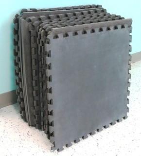 Group of 20 Interlocking Grey Foam Floor Cushioning Tiles.  Measure 24" x 24".  -  Room 8