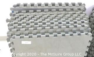 Group of 20 Interlocking Grey Foam Floor Cushioning Tiles.  Measure 24" x 24".  -  Room 8