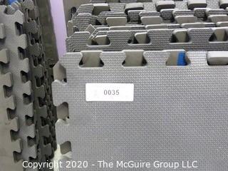 Group of 20 Interlocking Grey Foam Floor Cushioning Tiles.  Measure 24" x 24".  -  Room 9