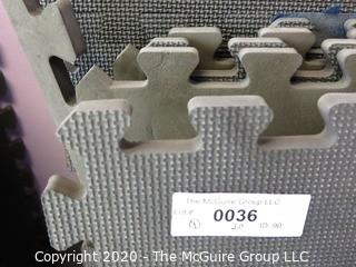 Group of 20 Interlocking Grey Foam Floor Cushioning Tiles.  Measure 24" x 24".  -  Room 9