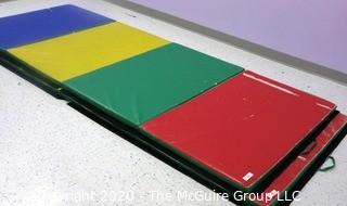 Two lots - one photo
One (1) 48" x 120" Rainbow Folding Tumbling Mat with hook-and-loop edges- Room 12