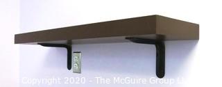 Wall Mount Shelf with Brackets.  Measures approximately 26"L x 10" W x 2" T.  DISASSEMBLY REQUIRED - Room 6 