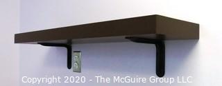 Wall Mount Shelf with Brackets.  Measures approximately 26"L x 10" W x 2" T.  DISASSEMBLY REQUIRED - Room 6 