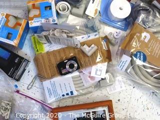 Box of Miscellaneous.  Includes Camera, Drawer Handles, Tools, Rubber Padding for Furniture, Chargers, etc.  - Room 6