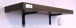 Wall Mount Shelf with Brackets.  Measures approximately 26"L x 10" W x 2" T.  DISASSEMBLY REQUIRED - Room 8 