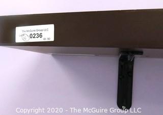 Wall Mount Shelf with Brackets.  Measures approximately 26"L x 10" W x 2" T.  DISASSEMBLY REQUIRED - Room 16