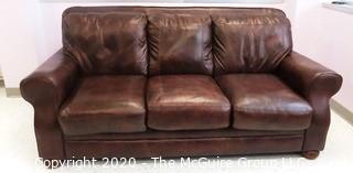 82"W x 37"T Brown Leather Sofa - Room 2