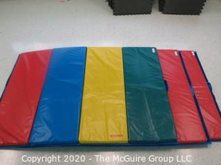 Three individual lots - one picture - one mat each lot
48" x 68" Rainbow Folding Tumbling Mat  - Room 11 {marked lot 93}