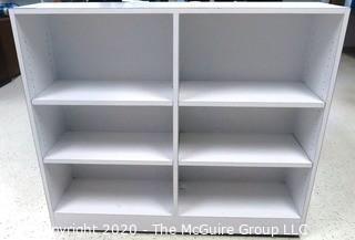 White Laminated Floor Standing Shelf.  Measures approximately 51" x 42" x 14".  - Room 1