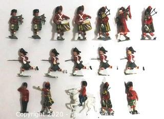 Group of Lead Metal Toy Soldiers Made by Britains of England.  Played with Condition.  Some Damage.