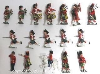 Group of Lead Metal Toy Soldiers Made by Britains of England.  Played with Condition.  Some Damage.